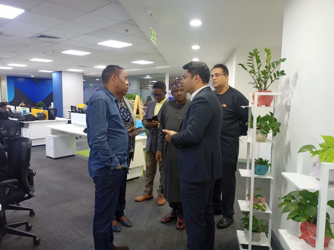 NCC delegates touring the Mobileum workspace