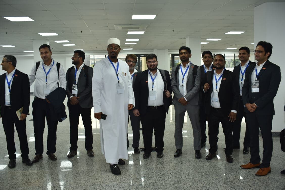 A group of delegates posing informally after the meeting