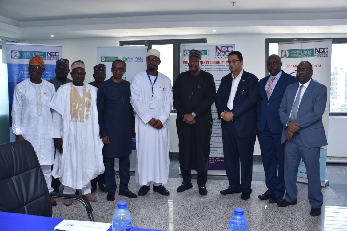 A smaller group of NCC officials and 3R Consortium representatives posing together