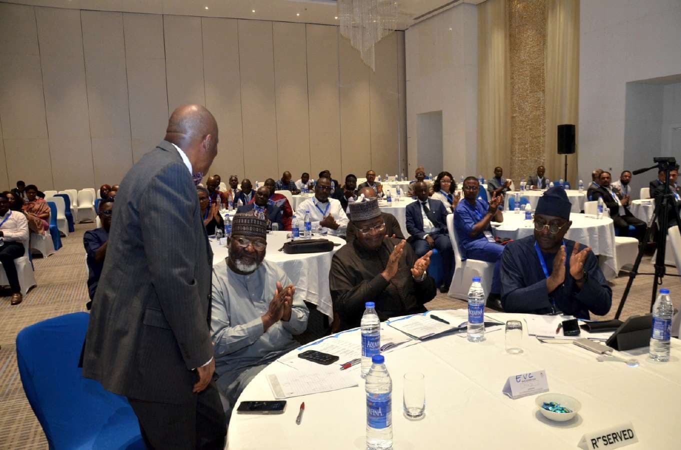 Delegates applauding during a workshop session