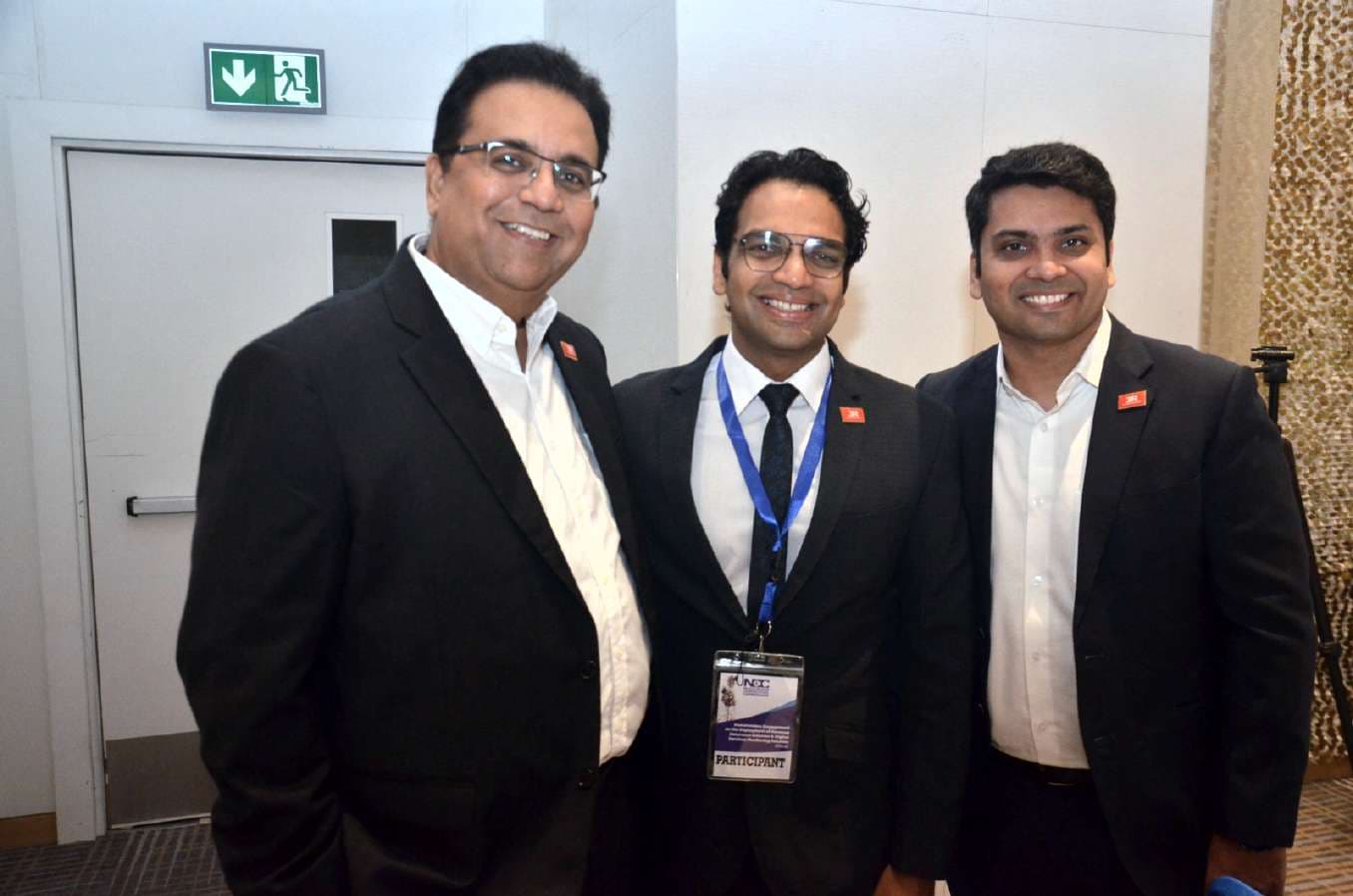 Three of 3R Consortium's technology partners posing together at the workshop